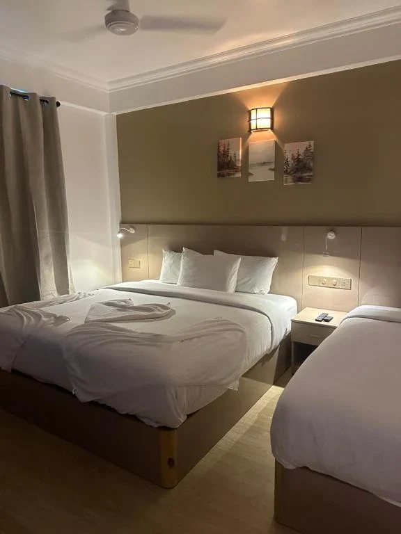 Фото отеля The G Ten Holiday Inn