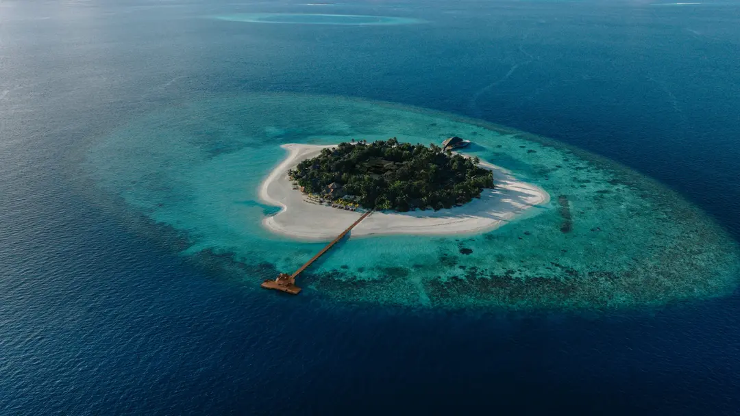 Остров и домашний риф Banyan Tree Vabbinfaru